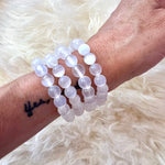 Let its gentle shimmy of a white surface do the healing and cleansing with this Selenite bracelet.